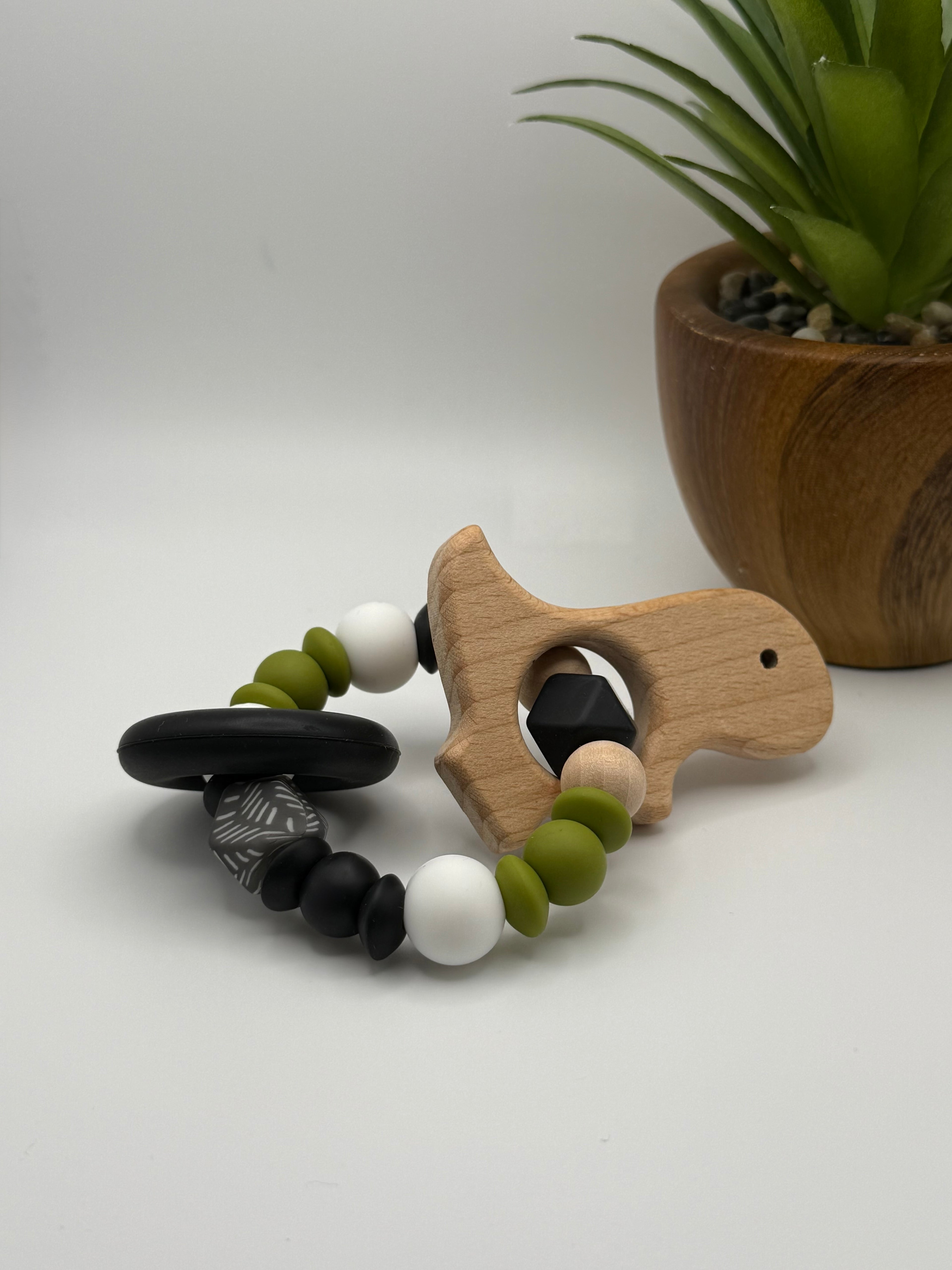 Anneau de silicone et dino en bois - vert